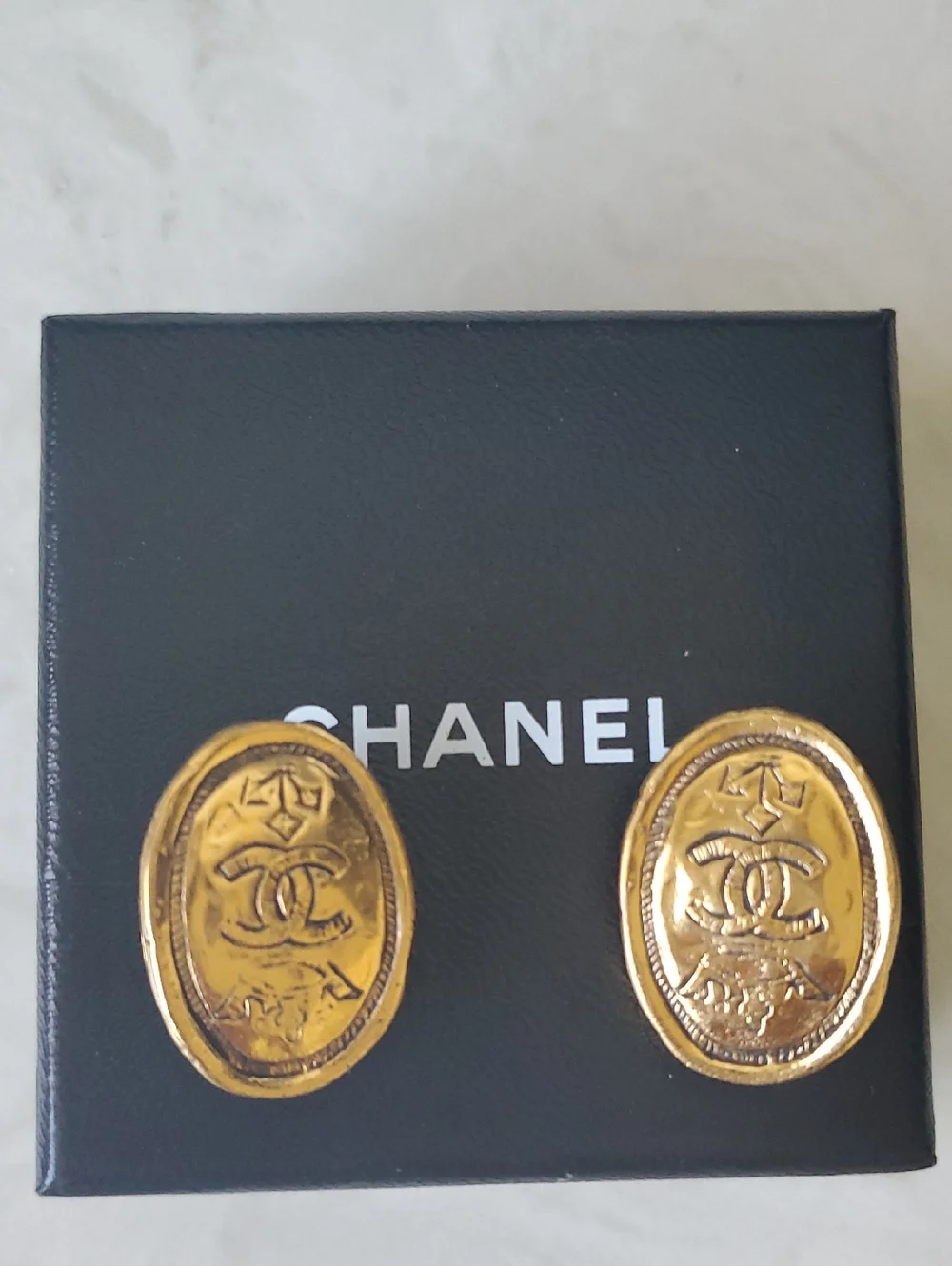 CHANEL Vintage Gold Logo Clip earrings